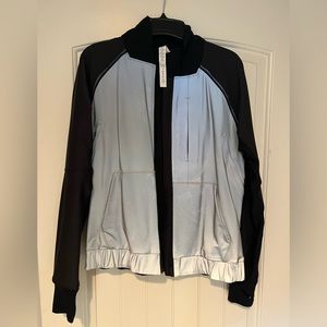 Lulu lemon reflective running jacket Paid $248never worn, not even once. Size6